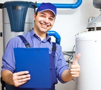 plumber posing with a thumbs up