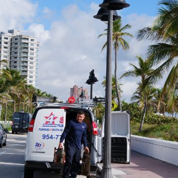 4 Star Plumbing Services team getting equipment from van