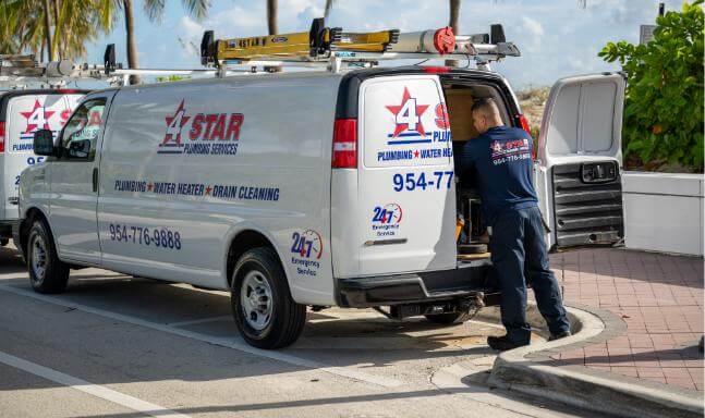 4 star plumbing services plumber unloading work van