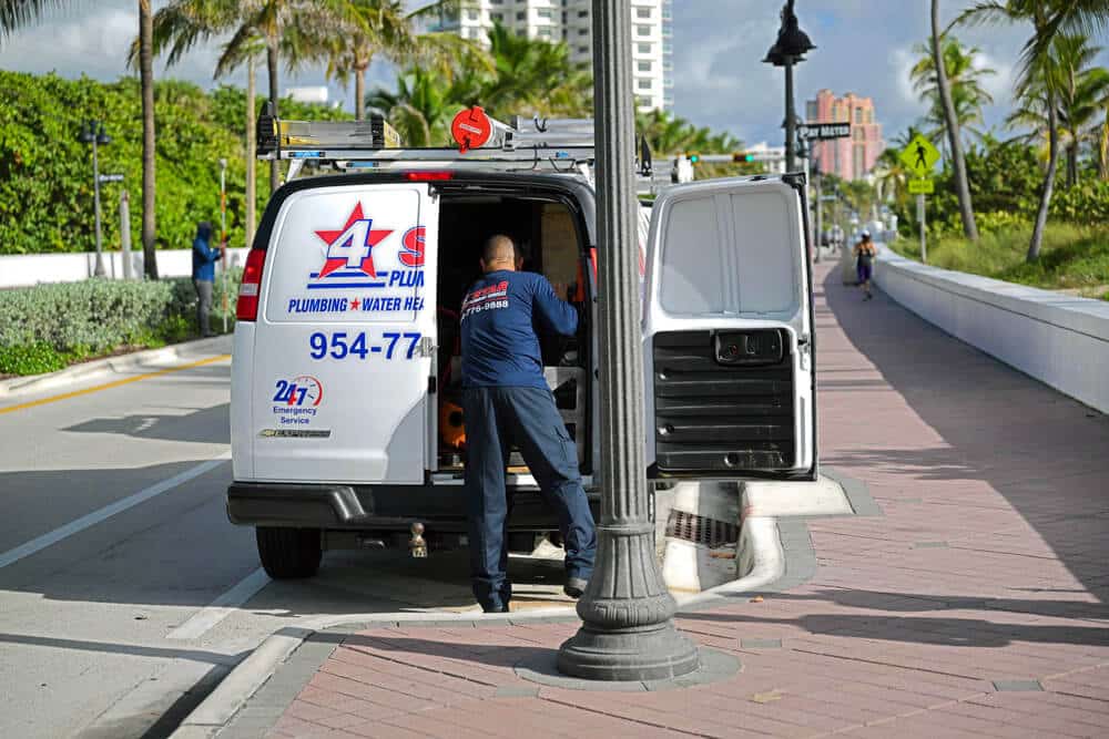 4 star technician getting tools for a commercial backflow valve repair